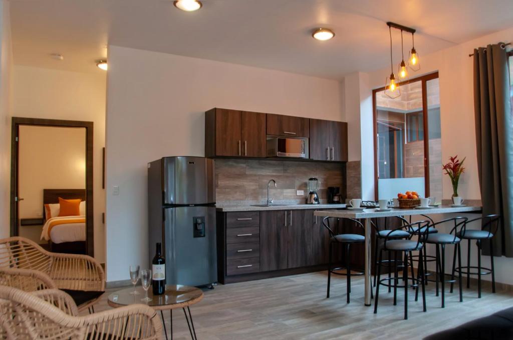Kuchyň nebo kuchyňský kout v ubytování Toucan Platinum Suites Aparthotel