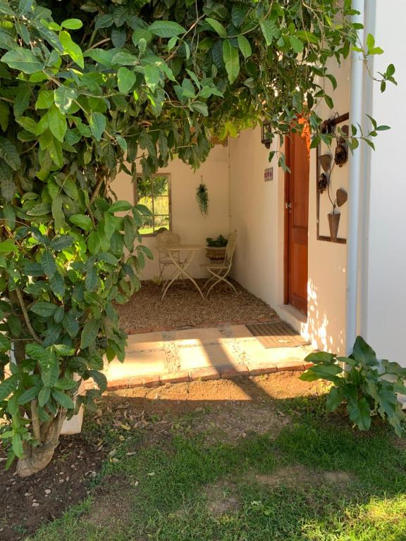 Un jardín fuera de Happy Lands Farmstay