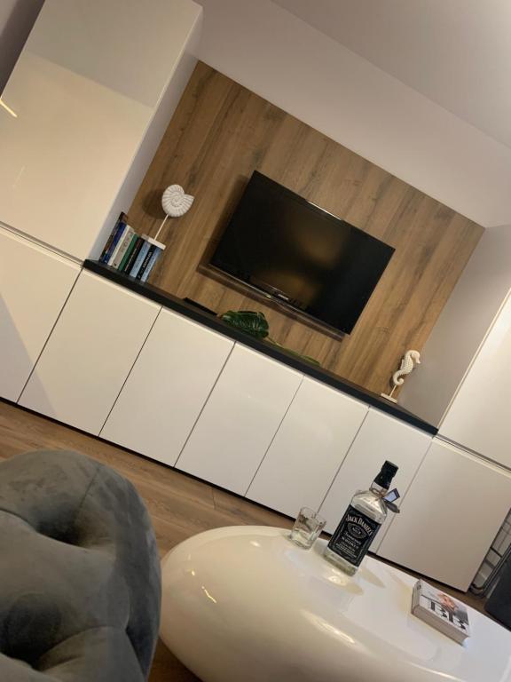 TV a/nebo společenská místnost v ubytování Daniel’s Apartament