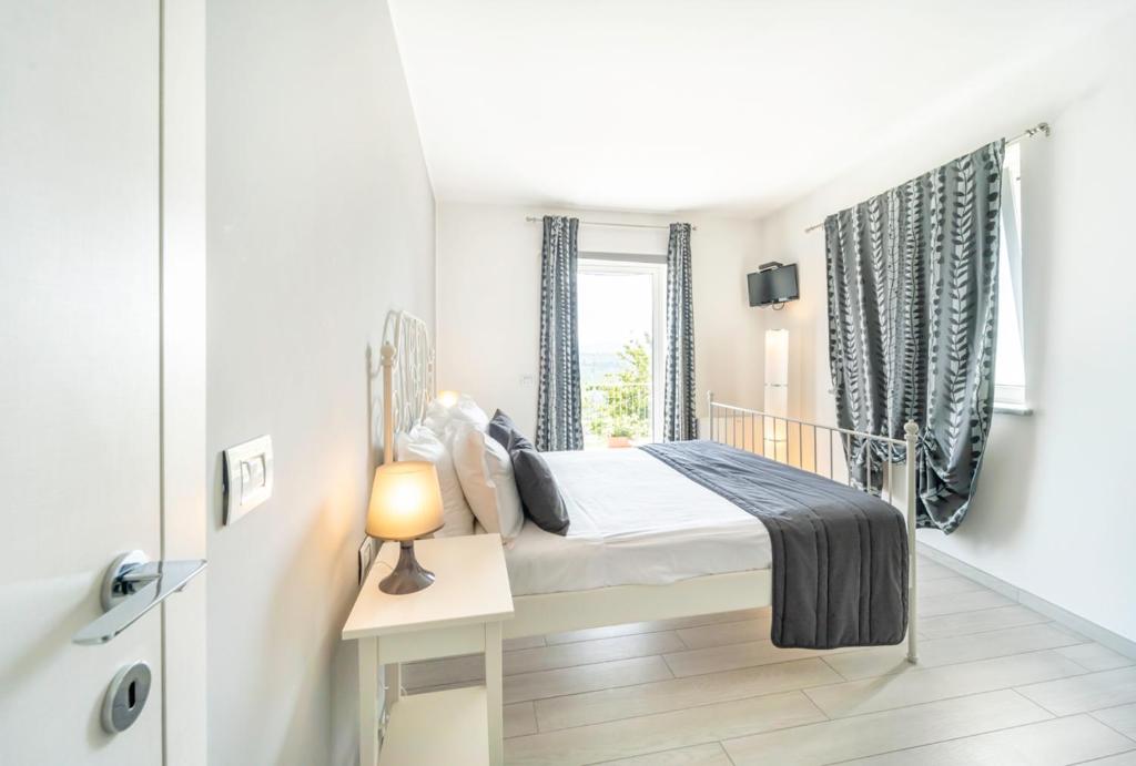 Posteľ alebo postele v izbe v ubytovaní La Villa Holiday House