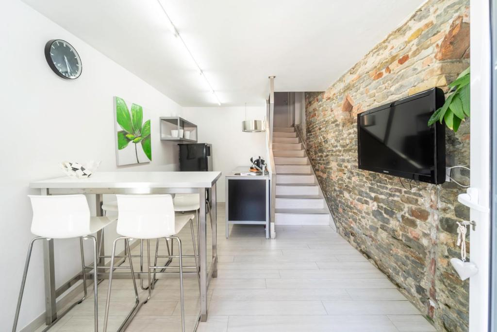 Televízia a/alebo spoločenská miestnosť v ubytovaní La Villa Holiday House