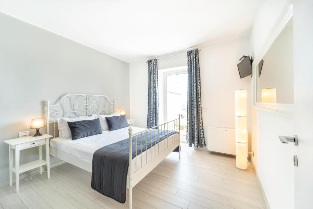 Posteľ alebo postele v izbe v ubytovaní La Villa Holiday House