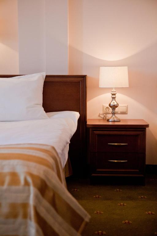 Posteľ alebo postele v izbe v ubytovaní Hotel Masovia