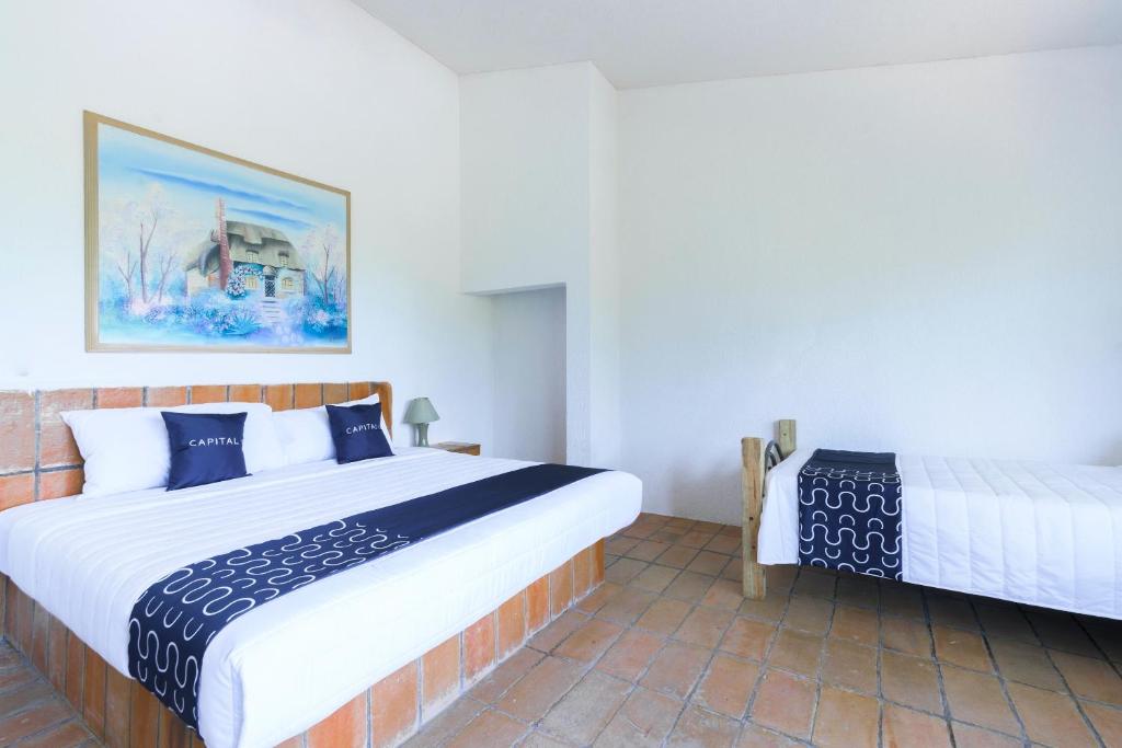 Postel nebo postele na pokoji v ubytování Cotlamani Hotel Aventura