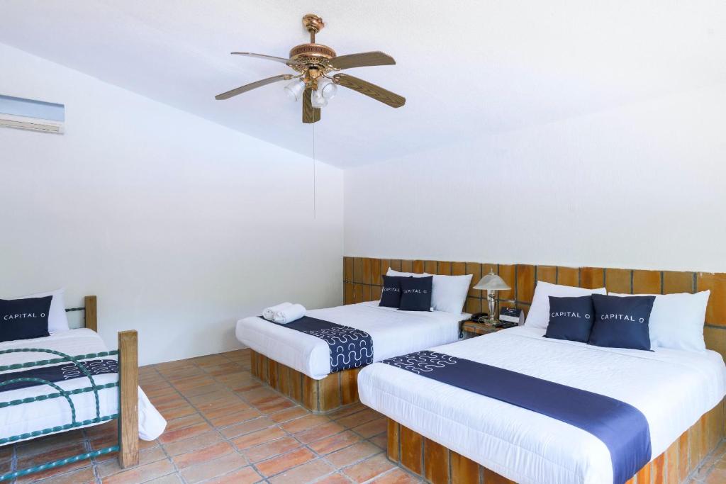 Postel nebo postele na pokoji v ubytování Cotlamani Hotel Aventura