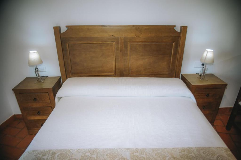 Postel nebo postele na pokoji v ubytování Casa Rural Los Belloso