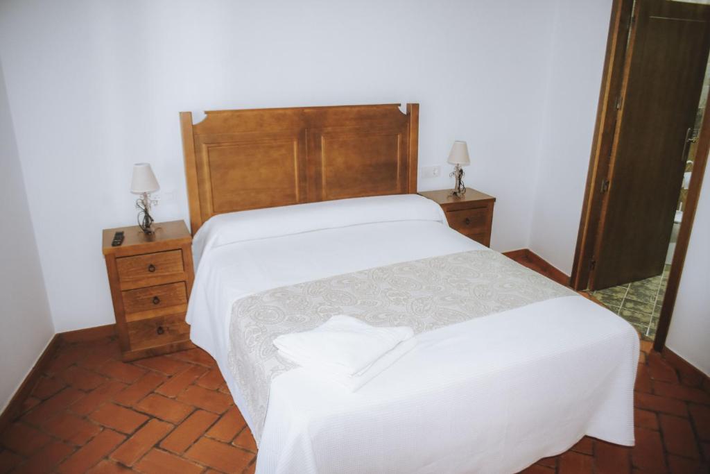 Postel nebo postele na pokoji v ubytování Casa Rural Los Belloso