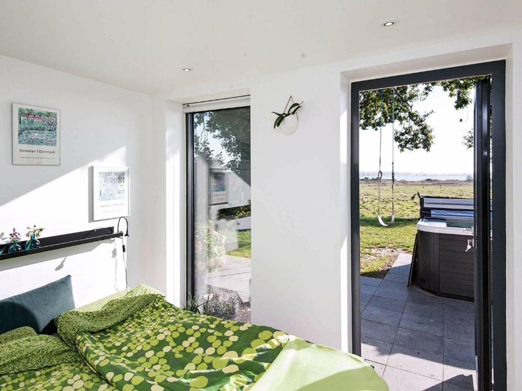 Postel nebo postele na pokoji v ubytování Holiday home Haderslev II
