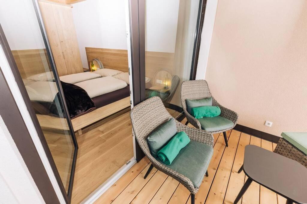 Postel nebo postele na pokoji v ubytování Baumgartnerhof Sauvigon