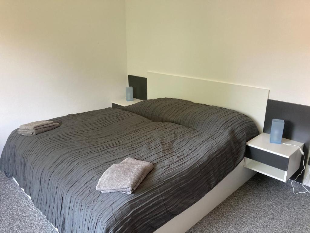 Postel nebo postele na pokoji v ubytování Apartmány Grasel