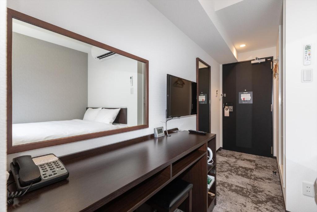 TV a/nebo společenská místnost v ubytování Hotel Tetora Kyoto Station