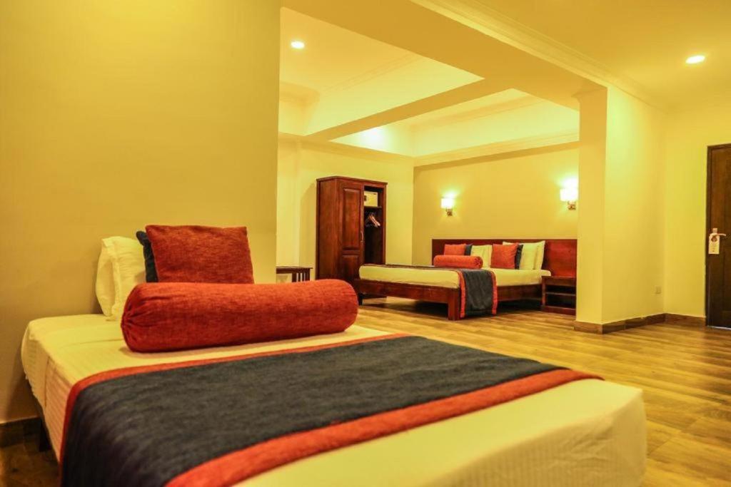 Postel nebo postele na pokoji v ubytování Oak Ray Ella Gap Hotel
