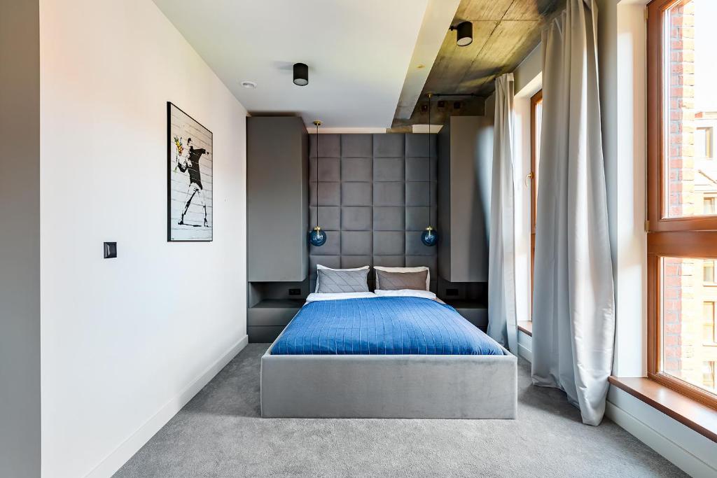Posteľ alebo postele v izbe v ubytovaní Homewell Boutique Apartments Stare Miasto