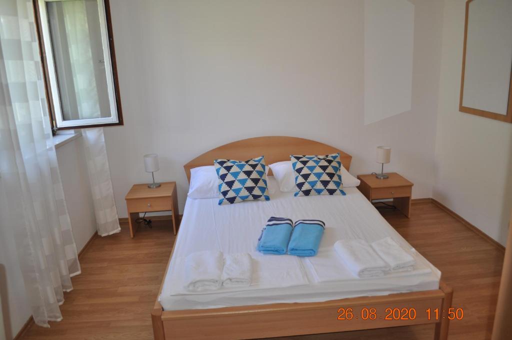 Posteľ alebo postele v izbe v ubytovaní Župa Dubrovačka Guest House