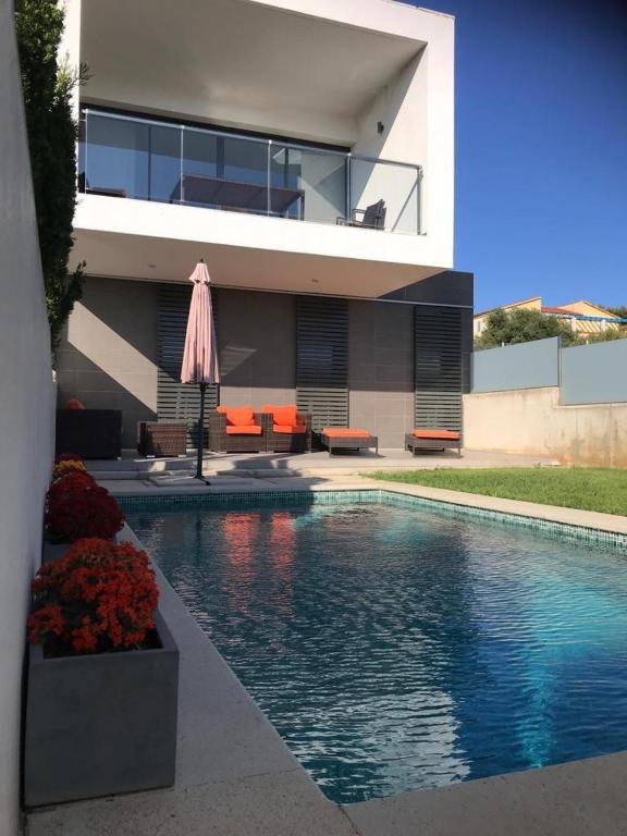 The swimming pool at or close to Luxus-Chalet-Casas-Blancas-cases-blanques-1-casa-A