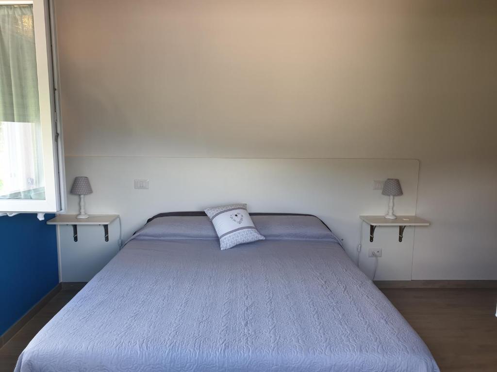 Letto o letti in una camera di Il Rifugio Del Tempo