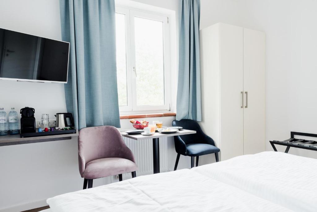 Postel nebo postele na pokoji v ubytování Müllner Smart Hotel Wien Self Check In