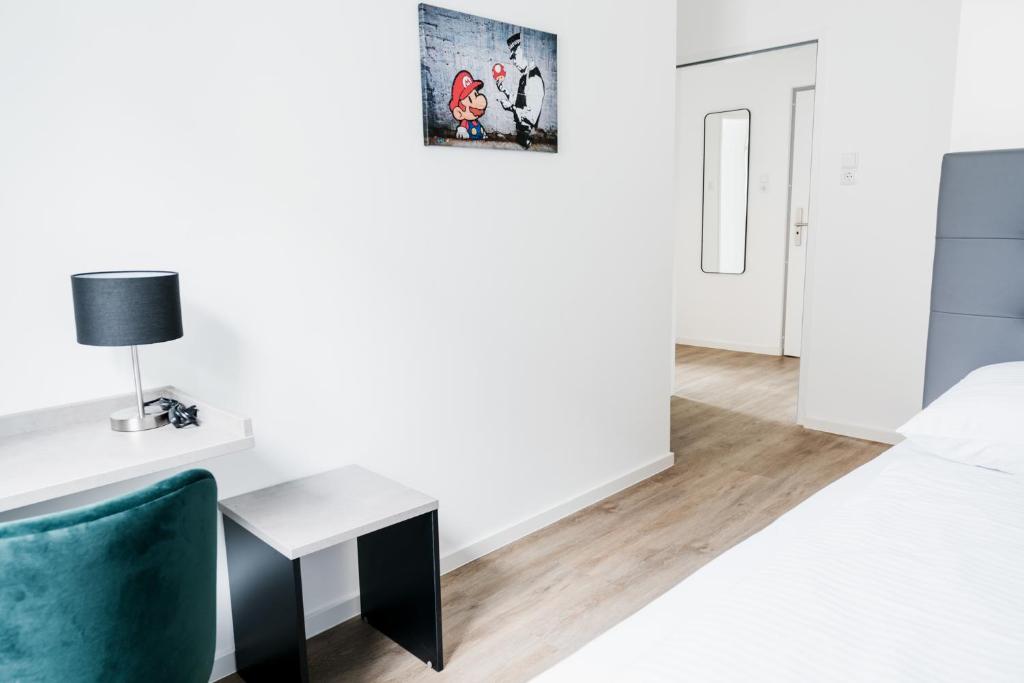 Postel nebo postele na pokoji v ubytování Müllner Smart Hotel Wien Self Check In
