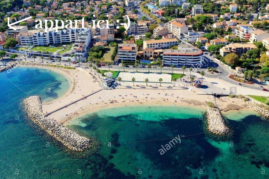 arial view of a beach in the city at Appart hôtel plage des capucins in La Ciotat