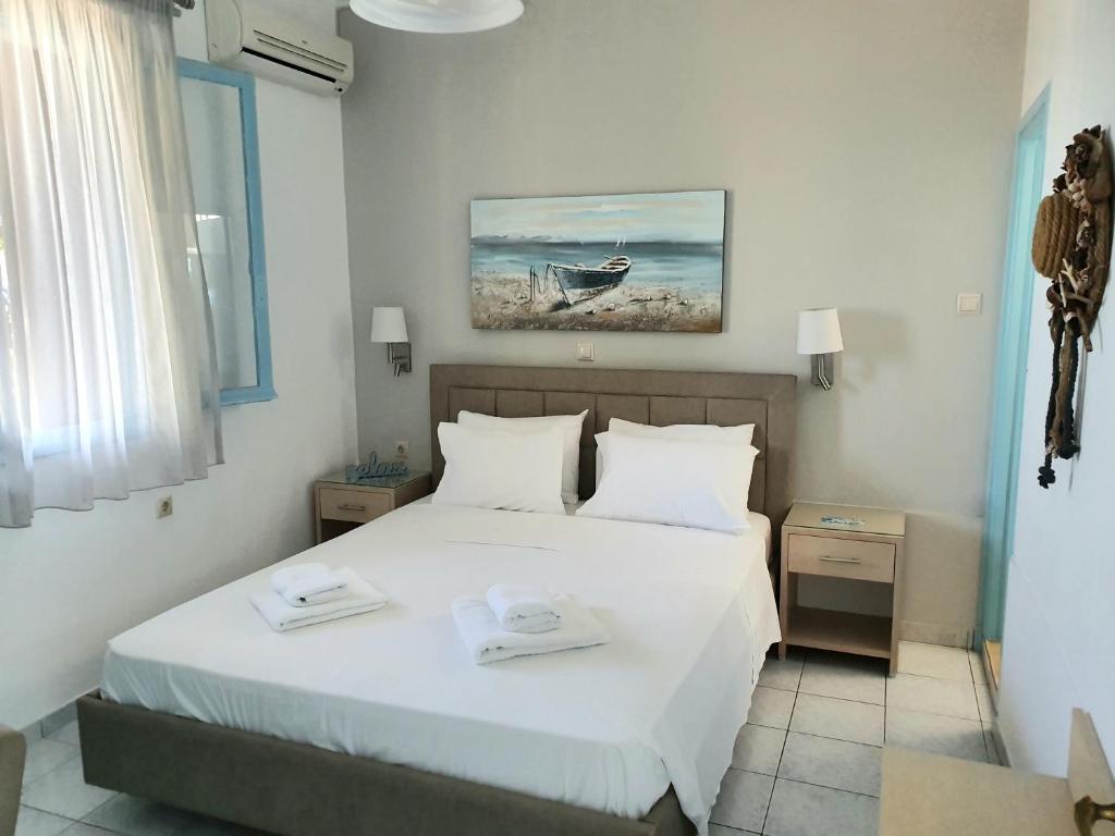 Posteľ alebo postele v izbe v ubytovaní Daglas Beach House
