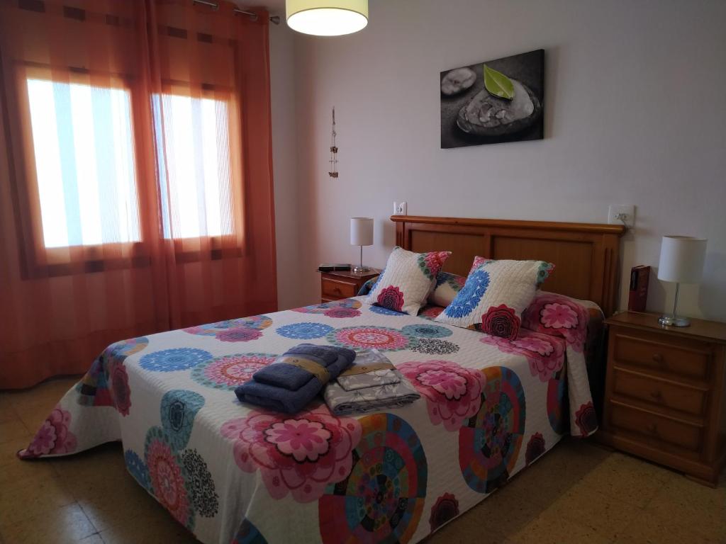 Posteľ alebo postele v izbe v ubytovaní Miami APARTAMENTO ANITA