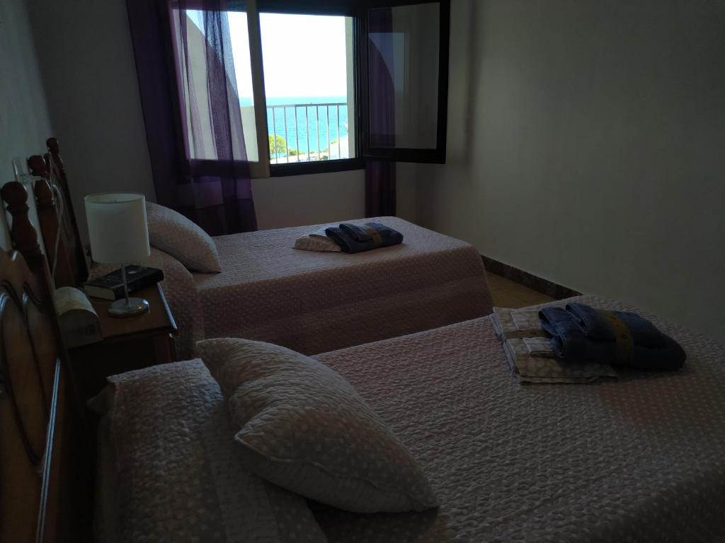 Posteľ alebo postele v izbe v ubytovaní Miami APARTAMENTO ANITA