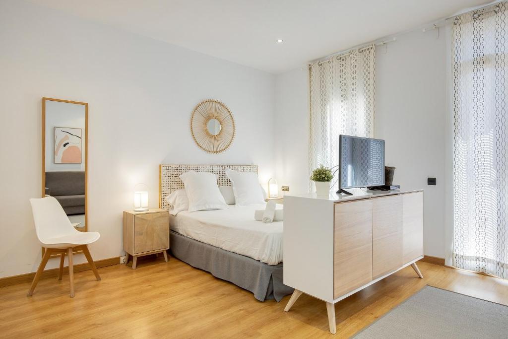 Posteľ alebo postele v izbe v ubytovaní Feelathome Center Apartments