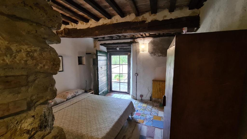 Postel nebo postele na pokoji v ubytování Casa Nati