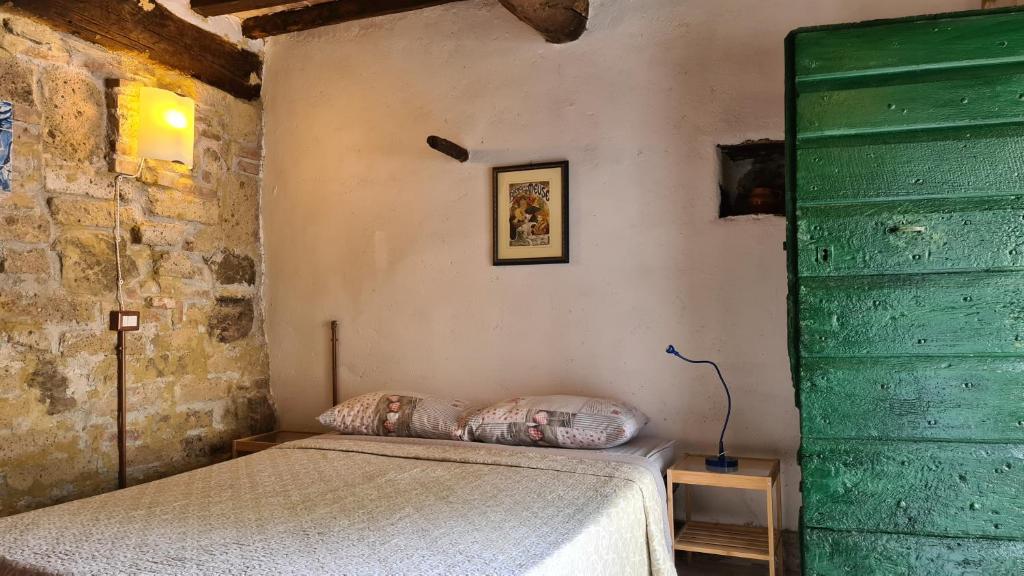 Postel nebo postele na pokoji v ubytování Casa Nati