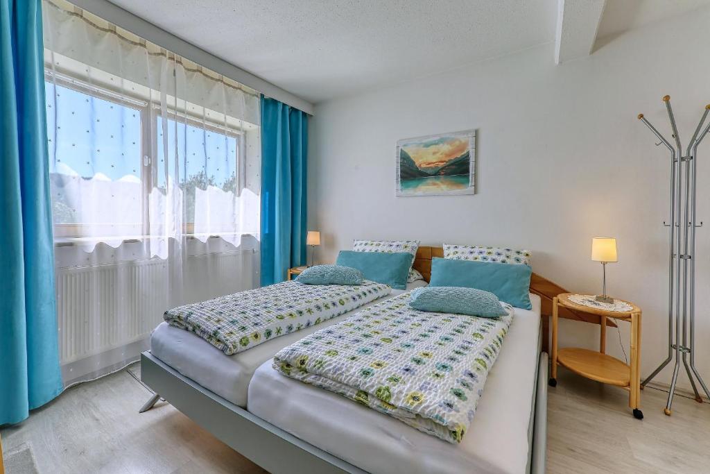 Ein Bett oder Betten in einem Zimmer der Unterkunft Ferienappartement Donautal