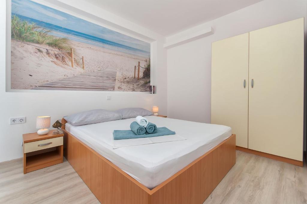 Posteľ alebo postele v izbe v ubytovaní Apartmani Joško Duće - Omiš