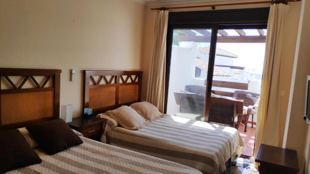 Postel nebo postele na pokoji v ubytování Vera playa apartamento 1dormitorio