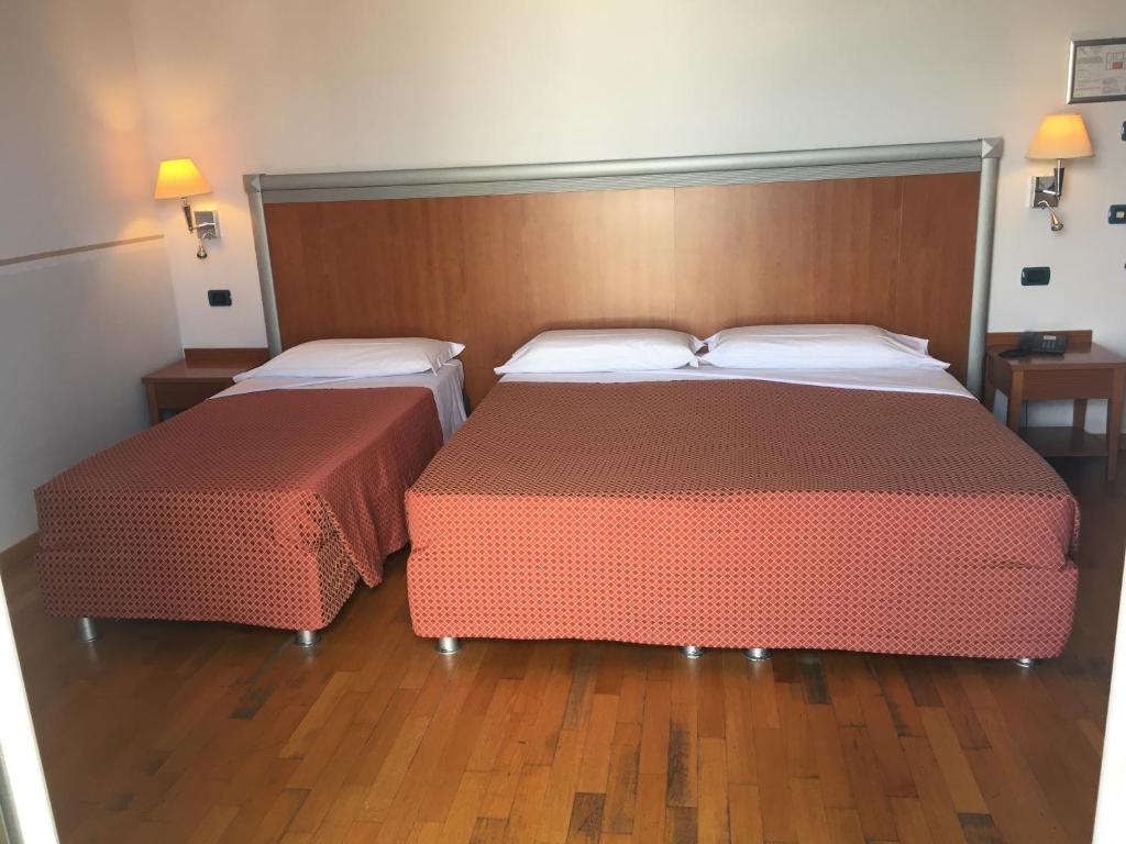Postel nebo postele na pokoji v ubytování West Florence