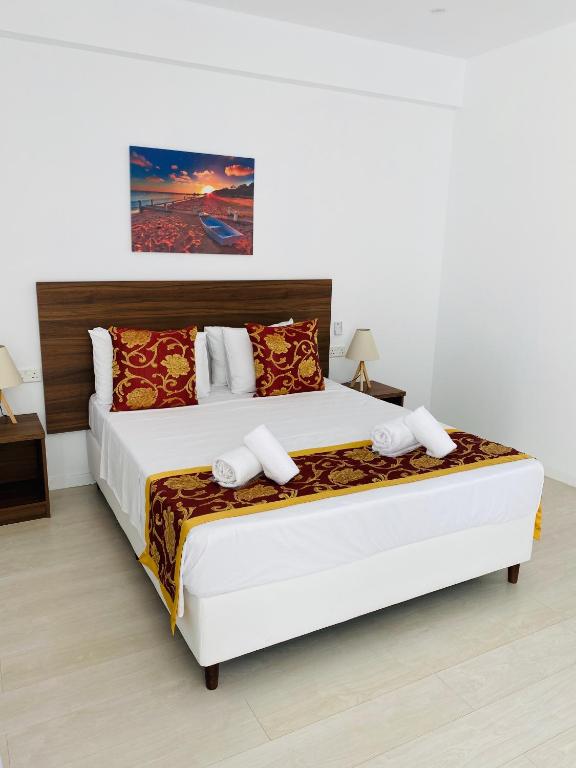 Postel nebo postele na pokoji v ubytování Lysithea Hotel