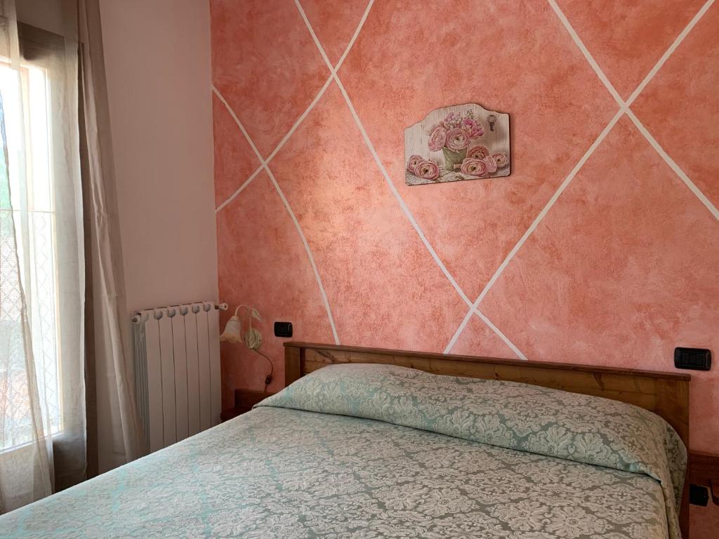 Postel nebo postele na pokoji v ubytování Residence il Varco del Pollino