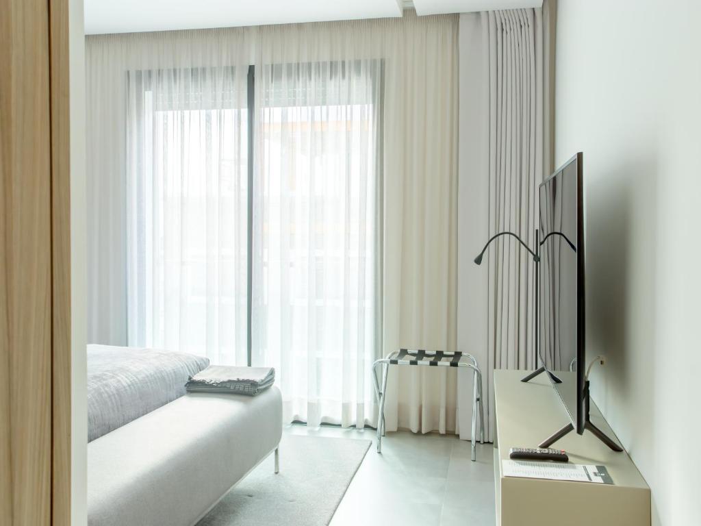 تلفاز و/أو أجهزة ترفيهية في Makass Appart Hotel
