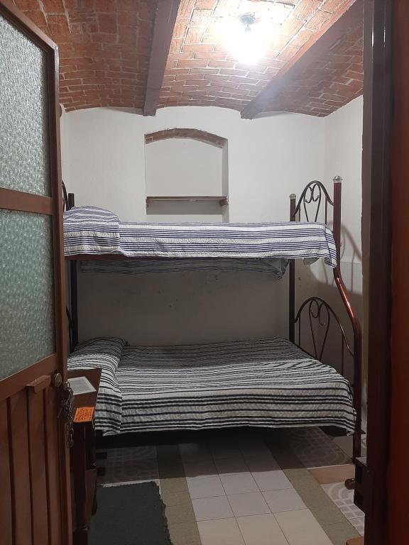 Postel nebo postele na pokoji v ubytování Casa Bertha