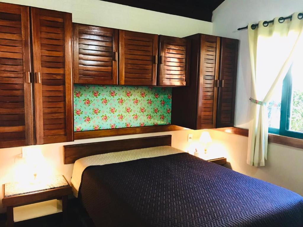 Katil atau katil-katil dalam bilik di Casa Chale 10 Florianópolis