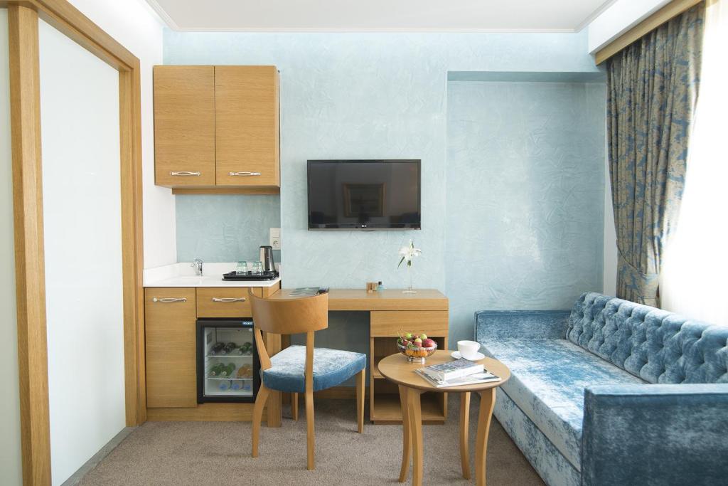 Kuchyň nebo kuchyňský kout v ubytování Cumbali Suite Hotel