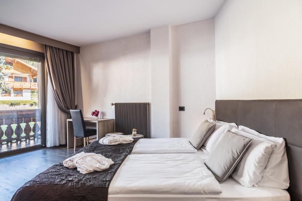 Letto o letti in una camera di Residence Anda