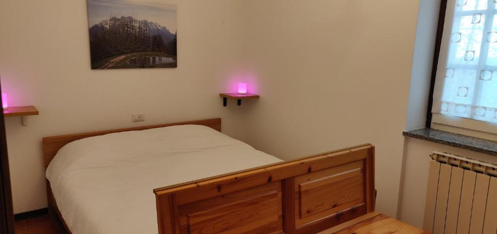 Posteľ alebo postele v izbe v ubytovaní Apartment Pineta dell'Alben
