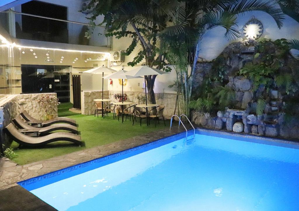 Bazén v ubytování Inkari Suites Hotel nebo v jeho okolí