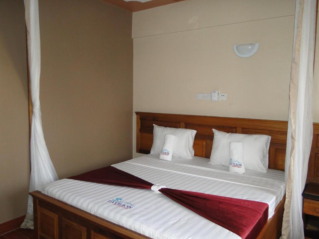Postel nebo postele na pokoji v ubytování Pavilion Holiday Resort