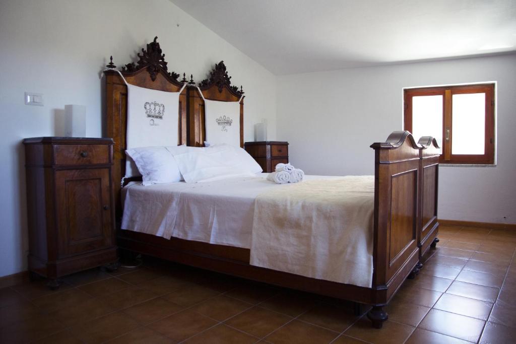 A bed or beds in a room at Nonna Maria