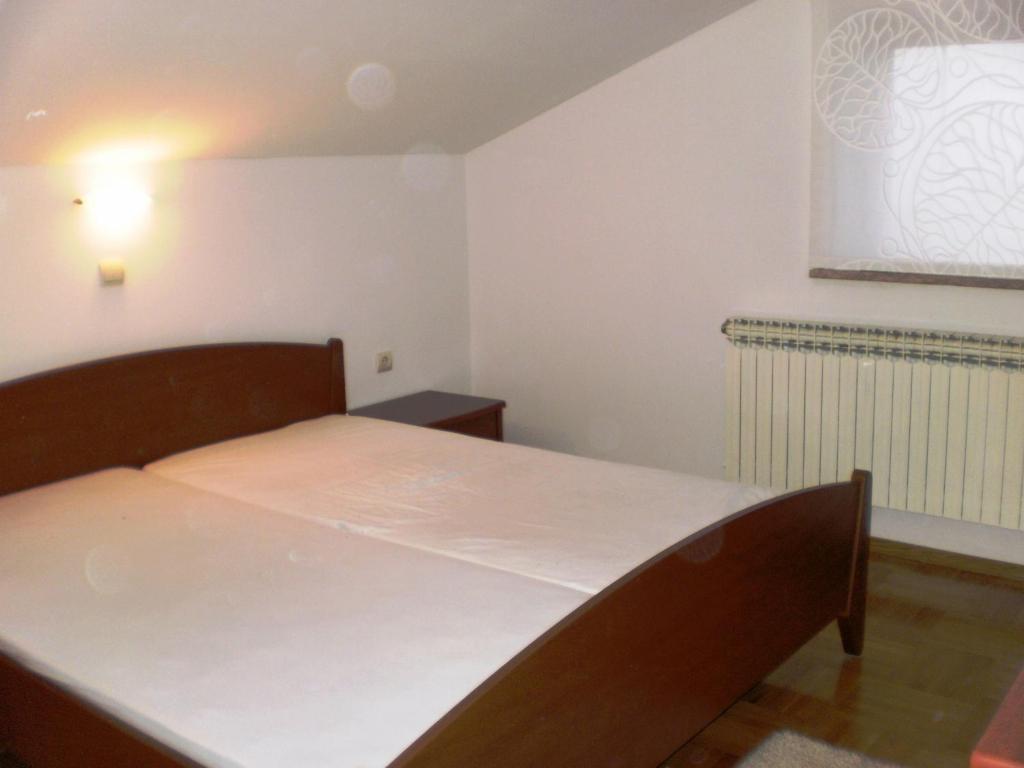 Posteľ alebo postele v izbe v ubytovaní Apartments Dida moj