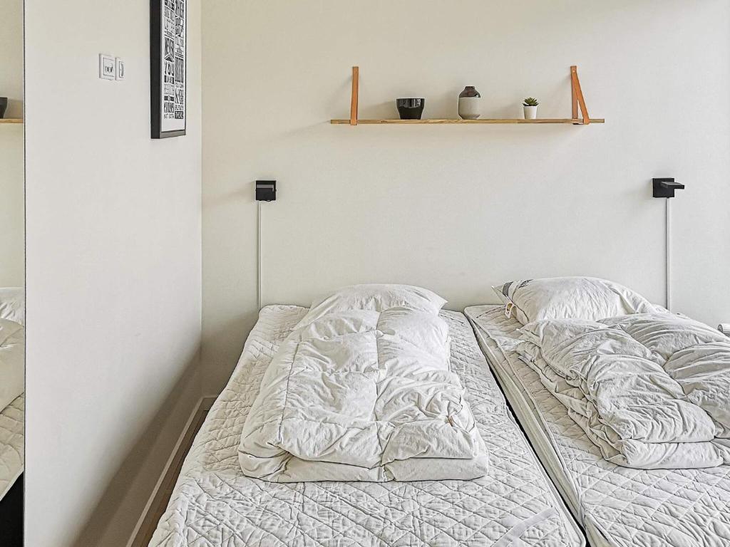 Postel nebo postele na pokoji v ubytování Luxury Spa Apartment in Sondervig - By Traum Ferienwohnungen
