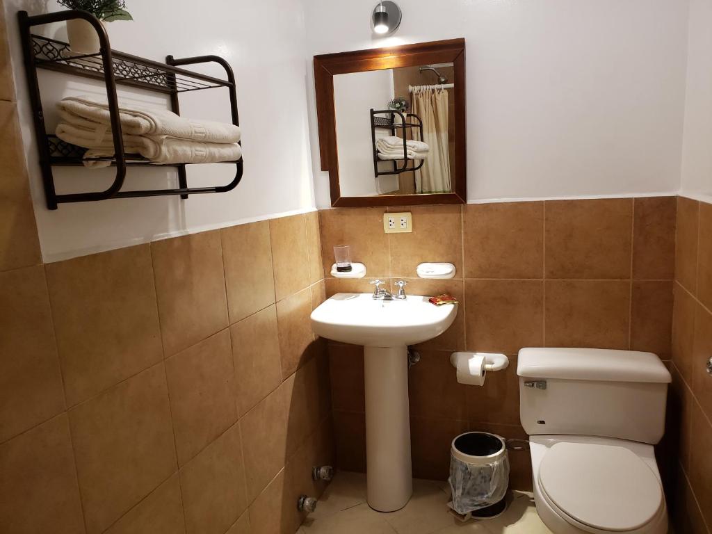 Koupelna v ubytování Arco Iris Atacames