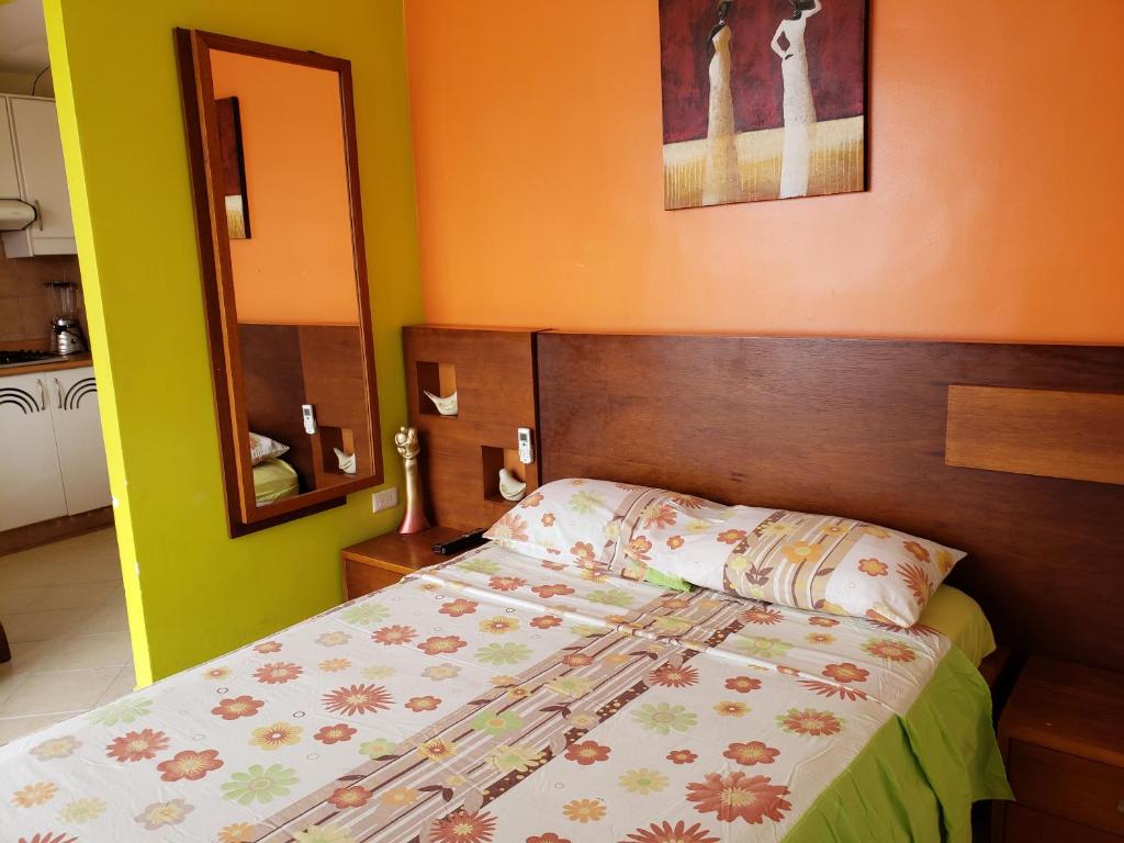 Postel nebo postele na pokoji v ubytování Arco Iris Atacames