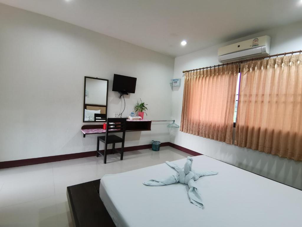Postel nebo postele na pokoji v ubytování Nestvilla Khok-kloi Phang-nga
