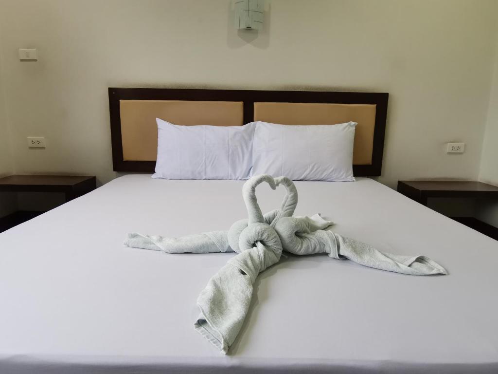 Postel nebo postele na pokoji v ubytování Nestvilla Khok-kloi Phang-nga